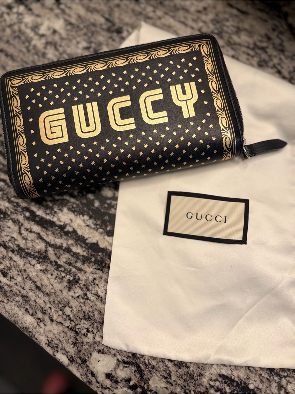 Gucci Black Wallet with Gold 'GUCCY' Logo